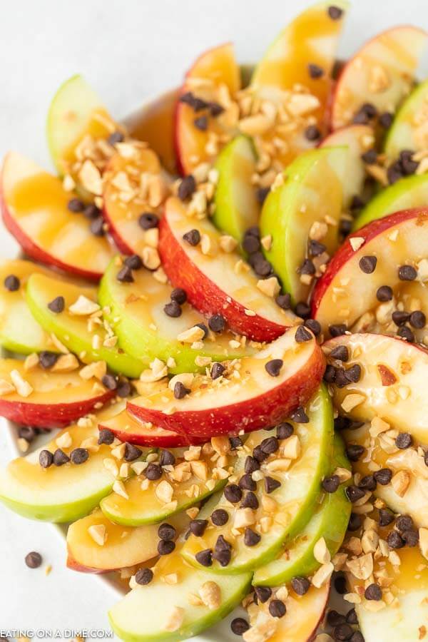 apple nachos with toppings on a plate