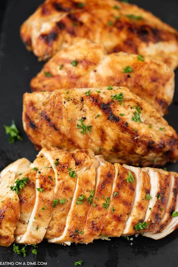 Grilled Chicken on a black platter 