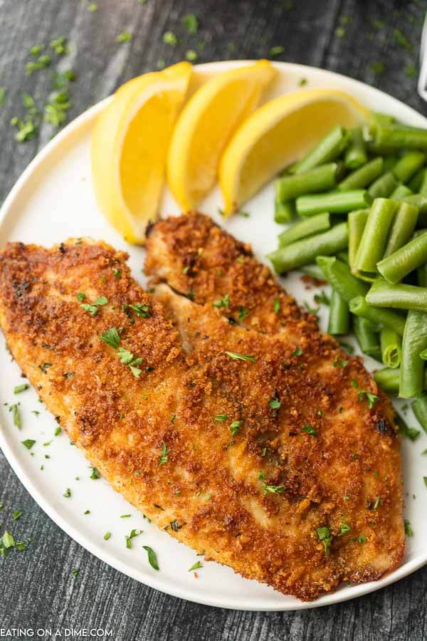 Enjoy crispy and delicious fish without frying or extra oil when you make this easy baked parmesan crusted tilapia. It is a family favorite.
