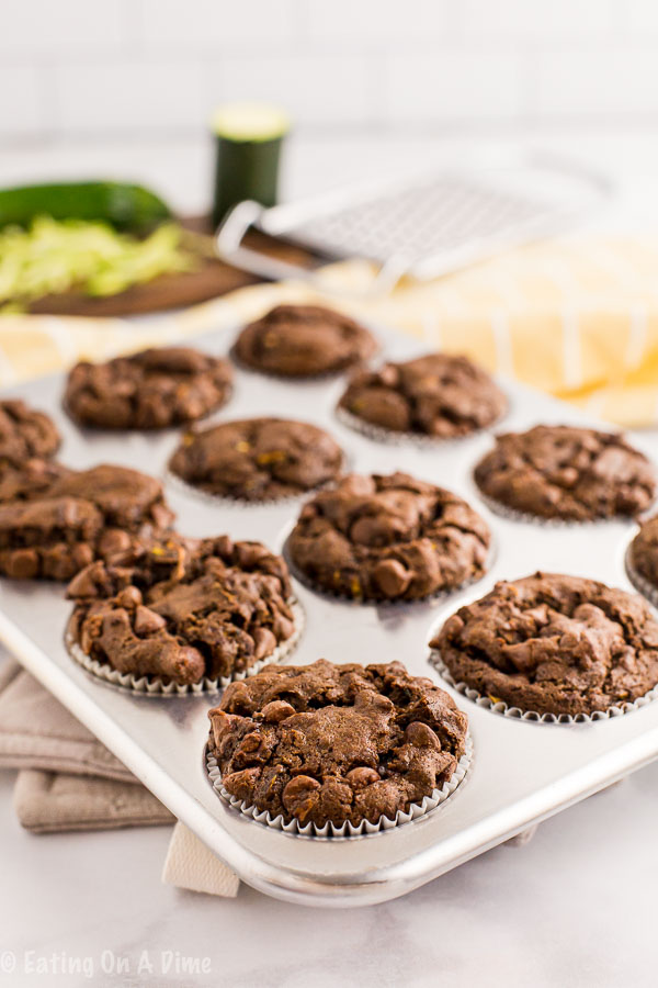 Chocolate zucchini muffins in muffin tin