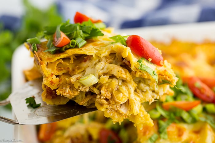 This easy chicken enchilada casserole recipe is a family favorite. Get all the great enchilada taste without any of the work for a great dinner idea.