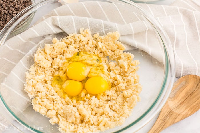 Adding in the eggs to the butter mixture