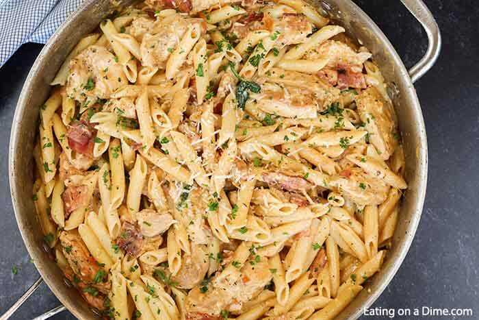 Creamy chicken pasta takes only 20 minutes for the best skillet dinner. Skip takeout and make this creamy dish in less time!
