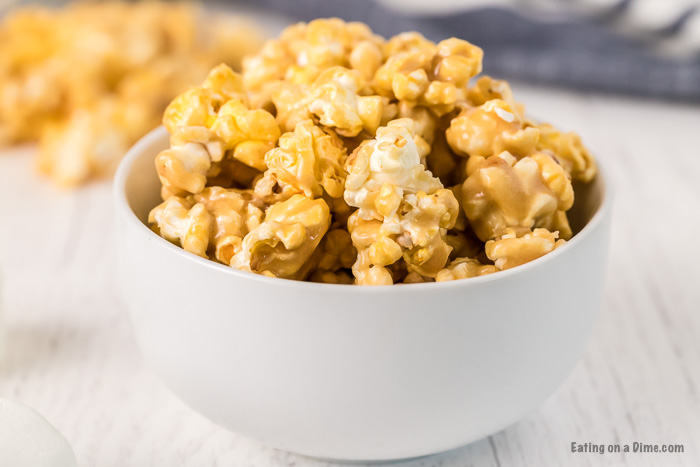Make this caramel marshmallow popcorn recipe for a fun afternoon snack! Marshmallow caramel popcorn is easy, fast, and fabulous!