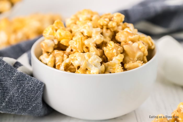 Make this caramel marshmallow popcorn recipe for a fun afternoon snack! Marshmallow caramel popcorn is easy, fast, and fabulous!