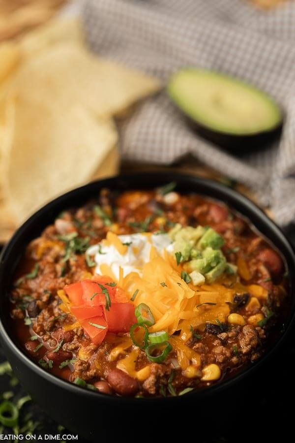 Jazz up traditional chili and make this easy Crockpot taco chili for an easy one pot meal. Everyone can choose their favorite toppings! 