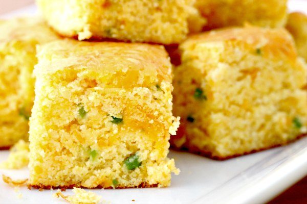 You have to try this easy jalapeño cheddar cornbread recipe. It is the perfect blend of spicy and sweet and everyone will love this easy cornbread recipe. You won’t believe how easy it is to make this cheddar jalapeño cornbread recipe with a Jiffy box mix. This cornbread is moist and amazing! #eatingonadime #cornbread #cornbreadrecipes #fallrecipes 