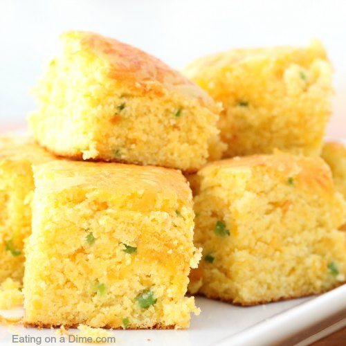 You have to try this easy jalapeño cheddar cornbread recipe. It is the perfect blend of spicy and sweet and everyone will love this easy cornbread recipe. You won’t believe how easy it is to make this cheddar jalapeño cornbread recipe with a Jiffy box mix. This cornbread is moist and amazing! #eatingonadime #cornbread #cornbreadrecipes #fallrecipes 