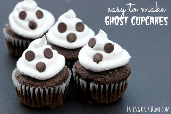 These cute ghost cupcakes are the perfect Halloween dessert. These Halloween Ghost Cupcakes are easy to make with Marhsmellow creme. These Marshmallow Ghost Cupcakes for kids are one of my favorite Halloween ideas. Try this ghost topper cupcakes today! #eatingonadime #halloweendesserts #cupcakerecipes 
