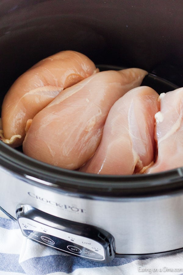 Placing the chicken in the crock pot