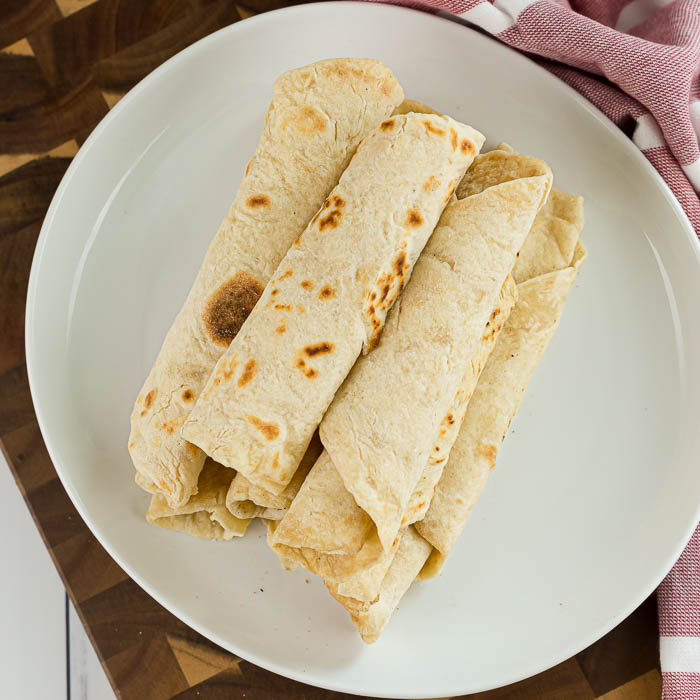 We have the best flour tortilla recipe that is super easy. You probably already have all of the ingredients on hand to make these. Give it a try today!