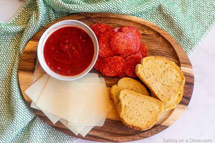 Ingredients - Spaghetti Sauce, Slice Pepperoni, Slice Mozzarella, and Frozen Texas Toast
