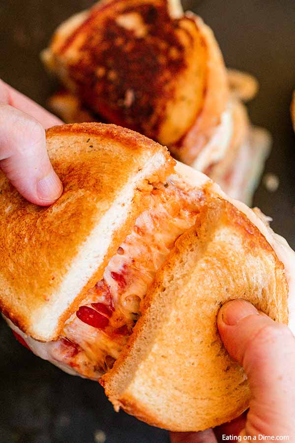 Jazz up plain grilled cheese with this delicious pizza grilled cheese sandwich recipe. Texas Toast makes this super easy. Your kids will go crazy over this!