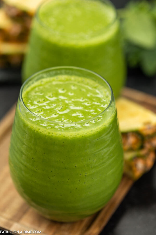 Pineapple spinach smoothie is so delicious and packs in a serving of veggies and fruit in one glass. Enjoy for breakfast, a snack or any meal. 