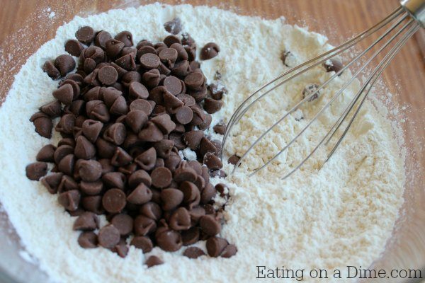 Satisfy your sweet tooth with this easy Chocolate chip cookie dough frozen yogurt recipe. You are going to be shocked how amazing this is.
