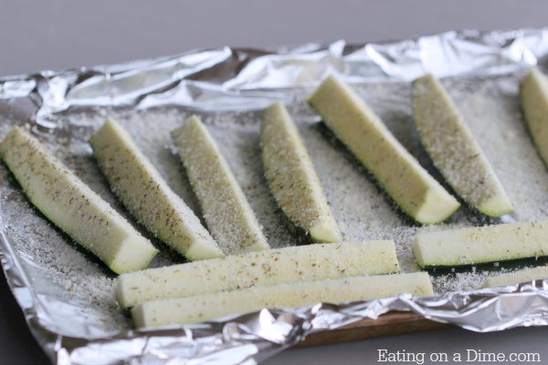 This Parmesan Roasted Zucchini Recipe is easy to make and tastes great. Oven roasted zucchini with parmesan is the best side dish! 