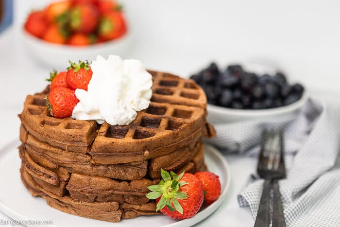 This cake mix waffles recipe is so fun and easy for the kids to make. These cake mix waffles boxes recipe can be made with your favorite flavors: funfetti, chocolate and strawberry. Learn how to make this cake mix waffles recipe with a box cake mix. This recipe is so easy, your kids can make this recipe boxes of cake mix waffles! #eatingonadime #cakemixrecipes #cakemixwaffles #easydesserts #kidrecipes This cake mix waffles recipe is so fun and easy for the kids to make. These cake mix waffles boxes recipe can be made with your favorite flavors: funfetti, chocolate and strawberry. Learn how to make this cake mix waffles recipe with a box cake mix. This recipe is so easy, your kids can make this recipe boxes of cake mix waffles! #eatingonadime #cakemixrecipes #cakemixwaffles #easydesserts #kidrecipes