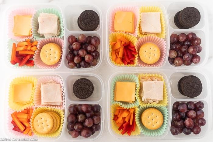How to make healthy lunchables that your kids will love. Homemade lunchables that you can make at home for less! Easy healthy lunchables for kids or for adults. This is one of my favorite lunchbox ideas! #eatingonadime #lunchrecipes #lunchboxrecipes #lunchables 