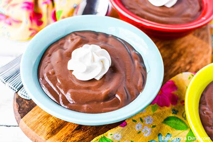 Chocolate Pudding in bowls and topped with whipped cream