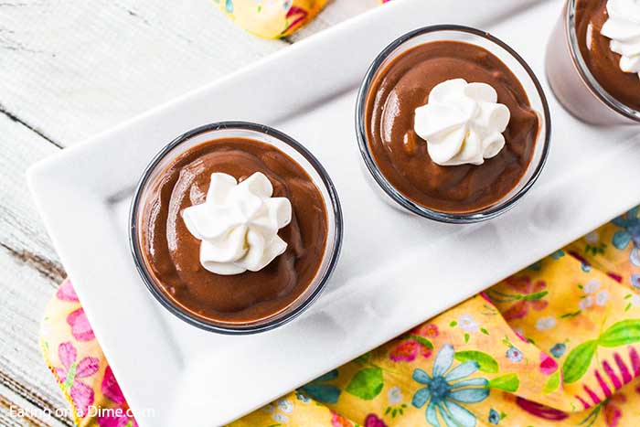 Chocolate Pudding in glasses and topped with whipped cream