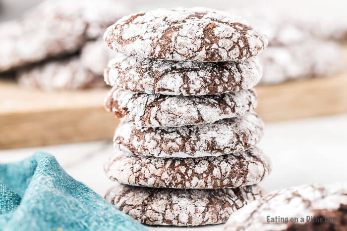 Try this easy Chocolate Brownie Cookies recipe. They are easy to make with brownie mix boxes. Learn how to make chocolate brownie mix cookies from a box. These cookies made from box mixes are fudgy, chewy and perfect for Christmas. These fudge brownies cookies can be made with only 5 ingredients and everyone loves them! #eatingonadime #cookierecipes #browniecookies #christmasdesserts #dessertrecipes 