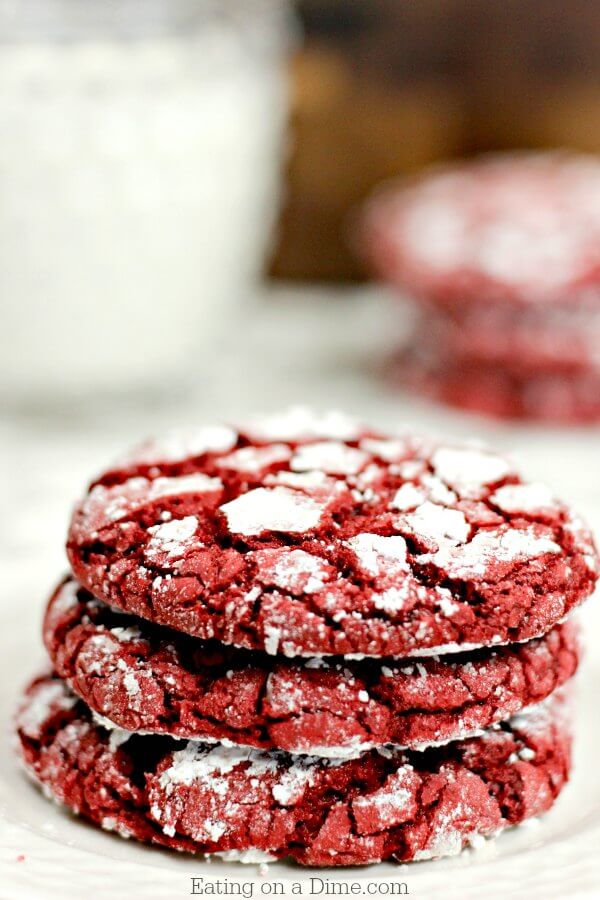 Picture of 3 red velvet cookies stacked on top of each cookie.