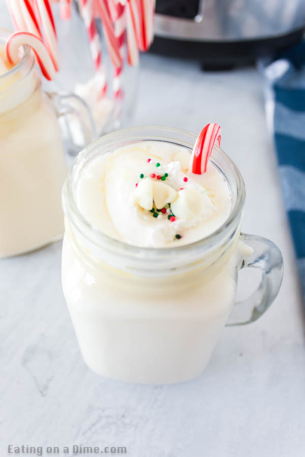 Crock pot white hot chocolate recipe is perfect to serve for a crowd at parties, holidays and more. Keep your hot chocolate warm all night long!