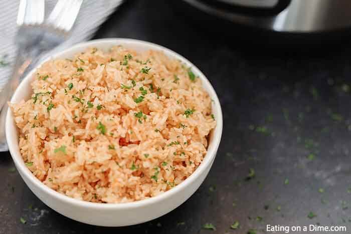  Instant Pot Spanish Rice recipe takes just minutes and makes the perfect side dish for enchiladas, tacos and more. The flavor is amazing!.#eatingonadime #instantpotrecipes #spanishrice #sidedishrecipe #easyrecipes 