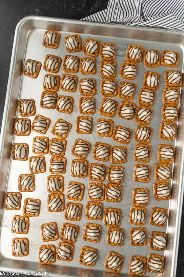 photo of baking sheet with Hershey kisses pretzels