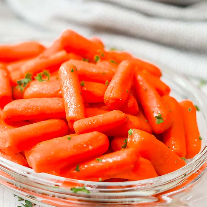 Brown Sugar Carrots pressure cooker recipe. This quick and easy instant pot brown sugar carrots tastes great and is healthy too. It is our favorite steamed glazed carrots recipe. You’ll love this simple pressure cooker side dish recipe. #eatingonadime #sidedishrecipes #carrotrecipes