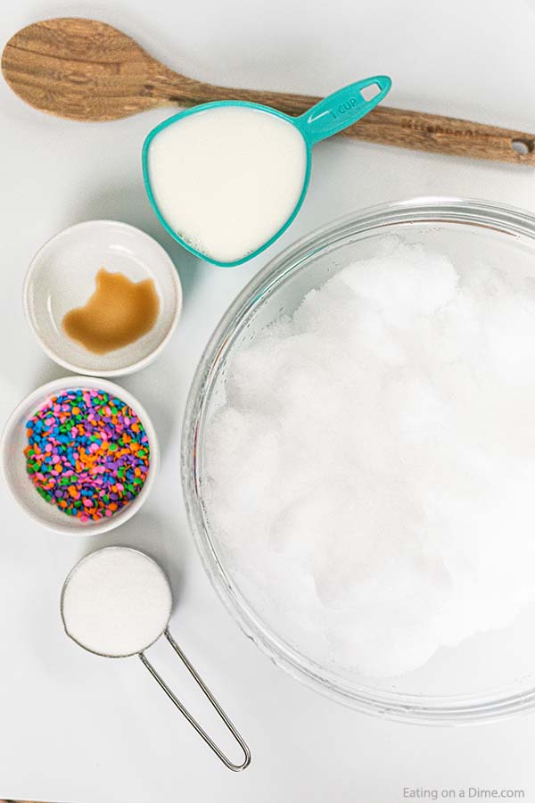 Close up image of ingredients needed for snow ice cream. 
