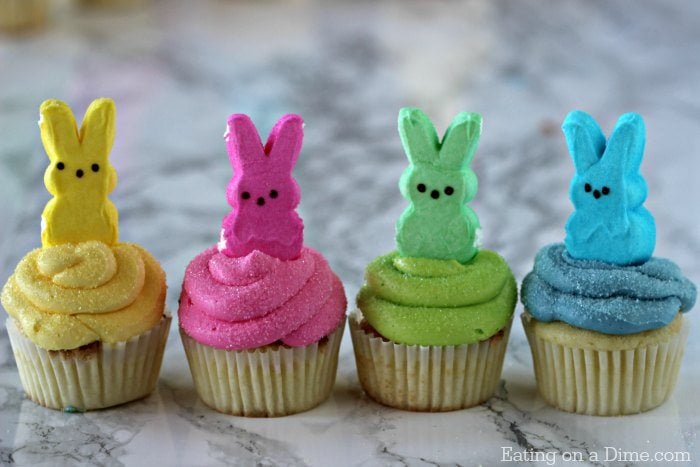 These Peeps Cupcakes are adorable. Easy Easter Cupcakes to make in minutes. Peeps cupcakes are now our favorite Easter Dessert Recipe. They are fun and the kids loved these cupcakes with peeps. #eatingonadime #Eastercupcakes #Easterdessertsideas