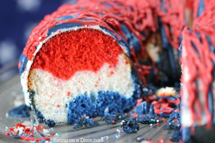 Slice of Red White and Blue cake on a cake plate