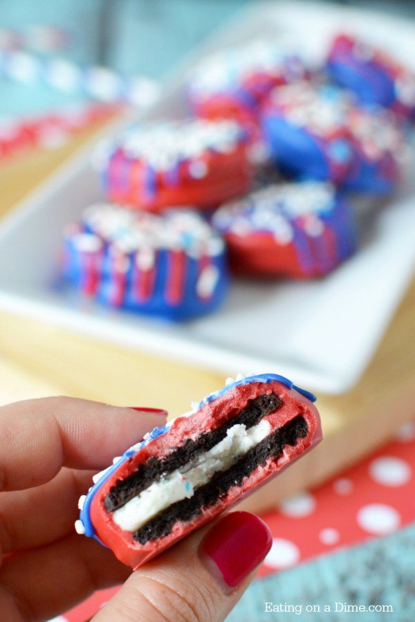 These 4th of July Chocolate Covered Oreos are delicious and so easy to make. It is one of our favorite easy 4th of July Desserts! Make these Red white and blue chocolate covered oreos today! It will be one of your favorite Quick and easy Fourth of July Desserts!