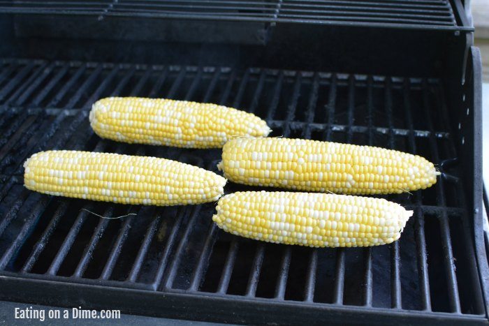 Close up image of corn on the cob on the grill. 