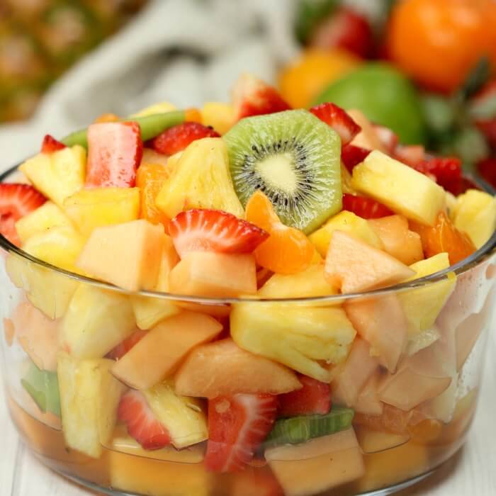 Close up image of fruit salad in a clear bowl. 