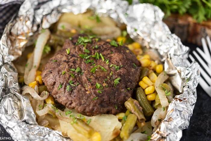 Hobo dinner foil packets are so delicious and clean up is a breeze. Everything you need for a great meal is in the foil pack. So tasty! Hobo dinner foil packets are so delicious and clean up is a breeze. Everything you need for a great meal is in the foil pack. So tasty!