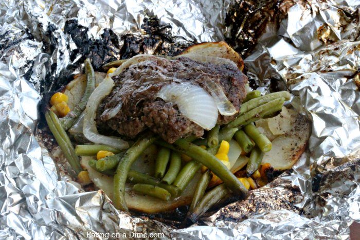 We love this simple Hobo Dinner Foil Packet Meal for the grill and campfires. It is the best hobo dinner recipe for Summer dinners and warm nights. Such an easy grilling recipe!