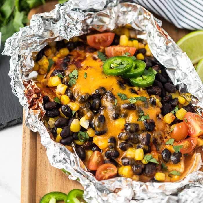 Santa fe Chicken foil pack has everything you need for a great dinner. Cheesy chicken, black beans, corn and even rice!