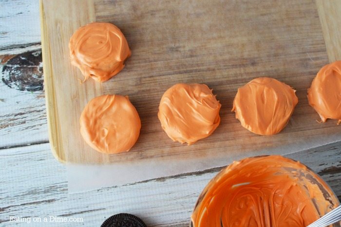 oreo cookies coated in orange candy melts