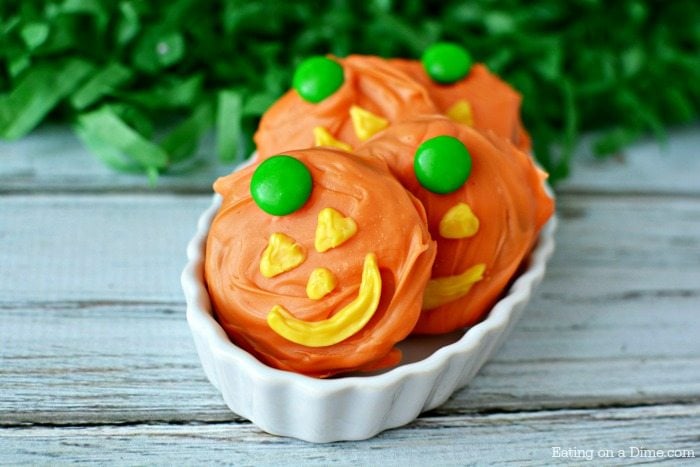 serving bowl of jack o lantern oreo cookies