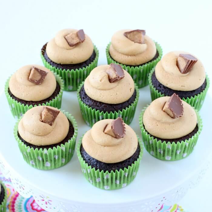 Close up image of Reese's Peanut Butter Cupcakes on a stand
