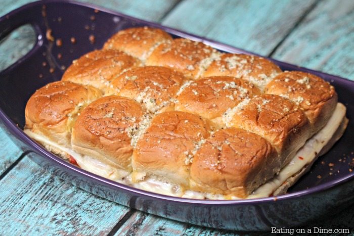Looking for an easy sliders recipe for game day? Try this fun Hawaiian roll pizza sliders recipe today! It is a fun twist on a pizza without all the work!