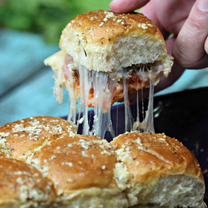 Looking for an easy sliders recipe for game day? Try this fun Hawaiian roll pizza sliders recipe today! It is a fun twist on a pizza without all the work!
