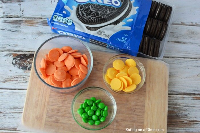 ingredients needed for recipe: oreo cookies, orange candy melts, yellow candy melts, green m&m candy
