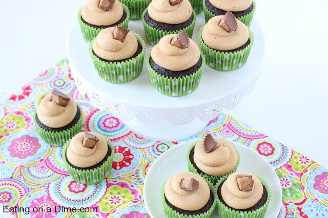 Close up image of Reese's Peanut Butter Cupcakes on a stand