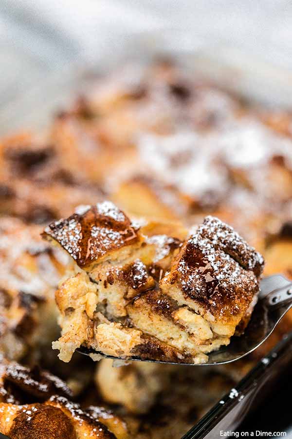 Close up image of a serving of french toast casserole on a fork. 