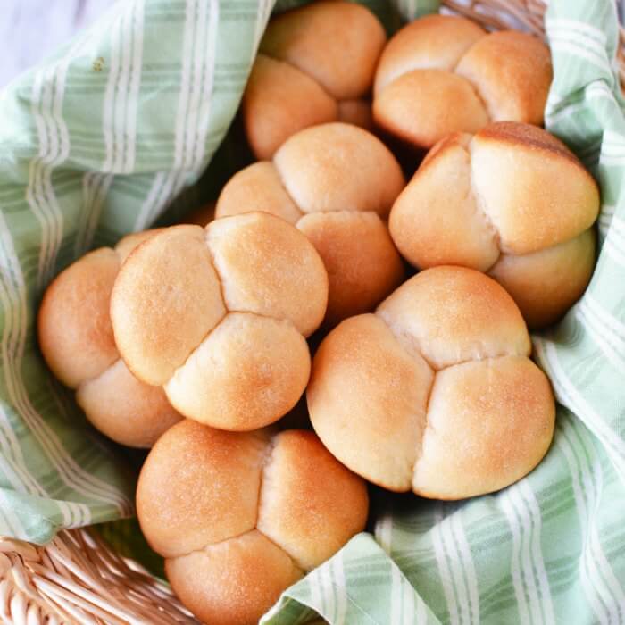 This Easy homemade dinner rolls recipe is going to be a big hit with your family! They are light and fluffy and tasty with butter on top!