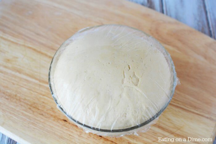 This easy homemade dinner rolls recipe is so delicious. You will love this best yeast rolls recipe! Learn how to make the best soft fluffy rolls recipe. These are the perfect dinner rolls recipes homemade that is perfect for Thanksgiving or everyday too! This rolls recipe easy is one of my favorite bread recipes! #eatingonadime #breadrecipes #thanksgivingrecipes 
