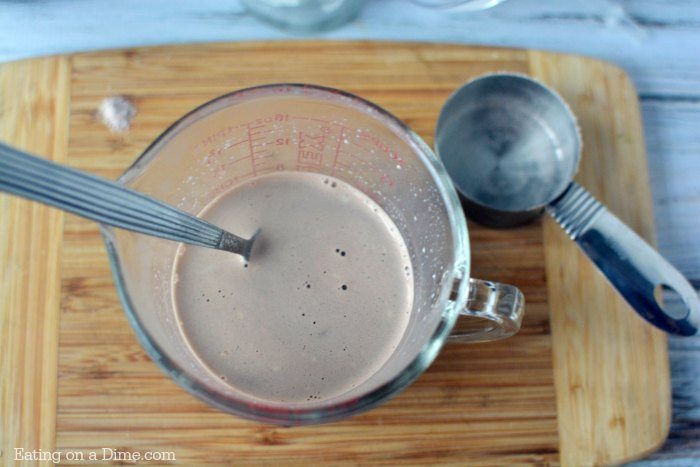 Try this quick and easy Iced Hot Chocolate Recipe. You are going to love this copycat frozen hot chocolate recipe that can be served frozen or over ice. This is an easy and delicious iced hot chocolate recipe. #eatingonadime #drinkrecipes #hotchocolaterecipes 